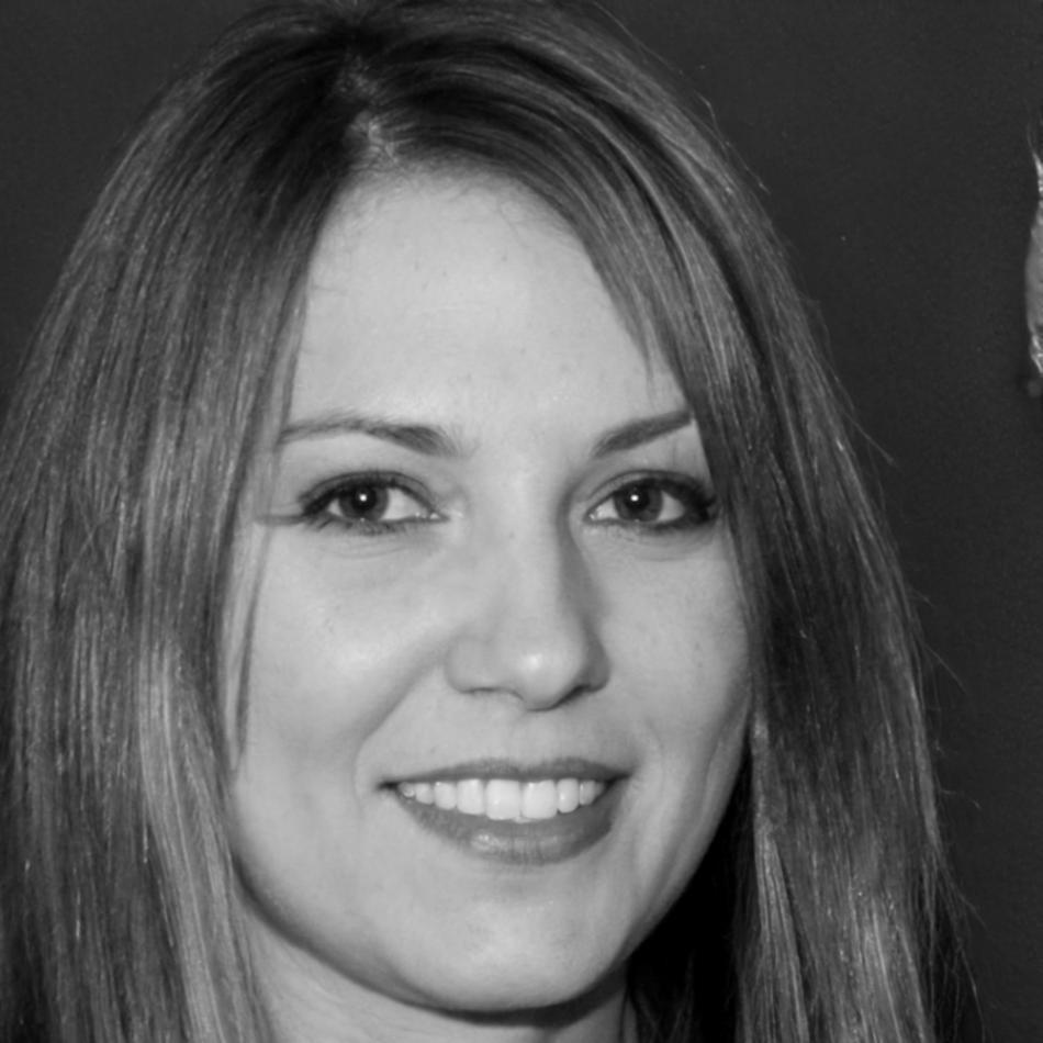 Portrait of female team member focusing on business analysis and blockchain consultation